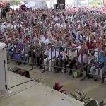 Hands are raised in agreement with a policy of prudence in Mexico's dealings with the US during AMLO's 'public consultation' in Veracruz.