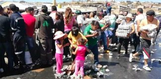 Scooping up free beer in Zacatecas.