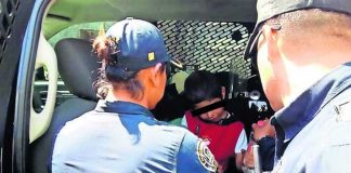 Police remove six-year-old Beto from his home yesterday.