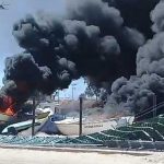 Burning boats in Thursday's clash in San Felipe.
