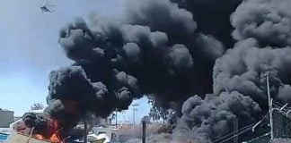 Burning boats in Thursday's clash in San Felipe.