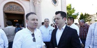 Security Secretary Durazo, left, with Colosio's son at a memorial on Saturday.