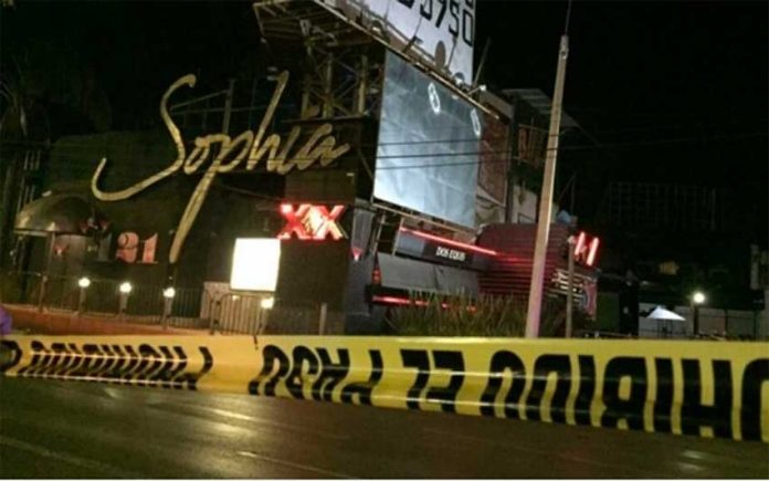 Crime scene tape at the Sophia bar Thursday night in Cuernavaca.