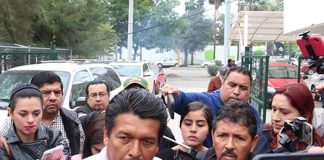 Farmers leader Ortiz, center.