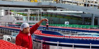 Coca-Cola Femsa was among the firms whose credit outlooks were cut.