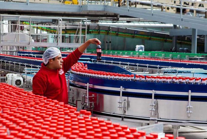 Coca-Cola Femsa was among the firms whose credit outlooks were cut.