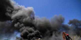 Smoke in San Felipe after clash between fishermen and the navy.