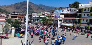 Juquila residents gather to protest inaction over highway blockade.
