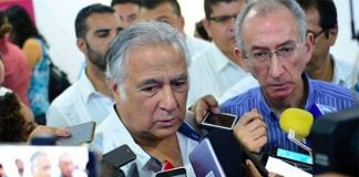 Tourism Secretary Torruco speaks with reporters.