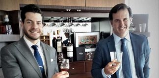 Edrington executive Juan Barbato, left, and Mexico manager Campos toast the Mexican whisky market.