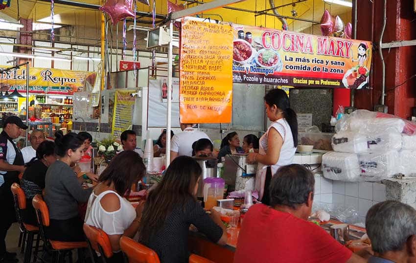 Always a happy crowd at the counter of Cocina Mary