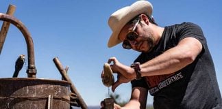 Ricardo Pico uses two horn-shaped vessels to estimate the alcohol content of the sotol he makes at his Chihuahua distillery.