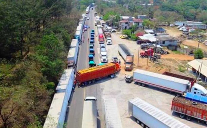 Trucks stranded by the blockade in Oaxaca.