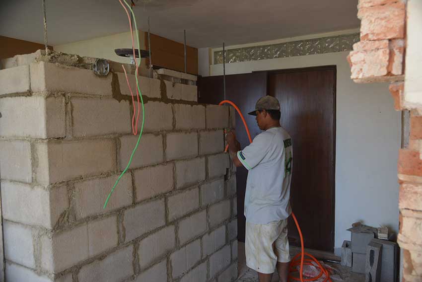 Concrete block wall such as this is not standard practice.