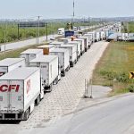 Trucks wait to cross the border in Ciudad Juárez.