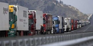 trucks wait at the border