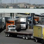 Trucks carry Mexican exports into the US at a Juárez-El Paso border crossing.