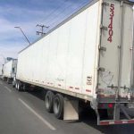 A long line of trucks waits to cross the border between Juárez and El Paso.