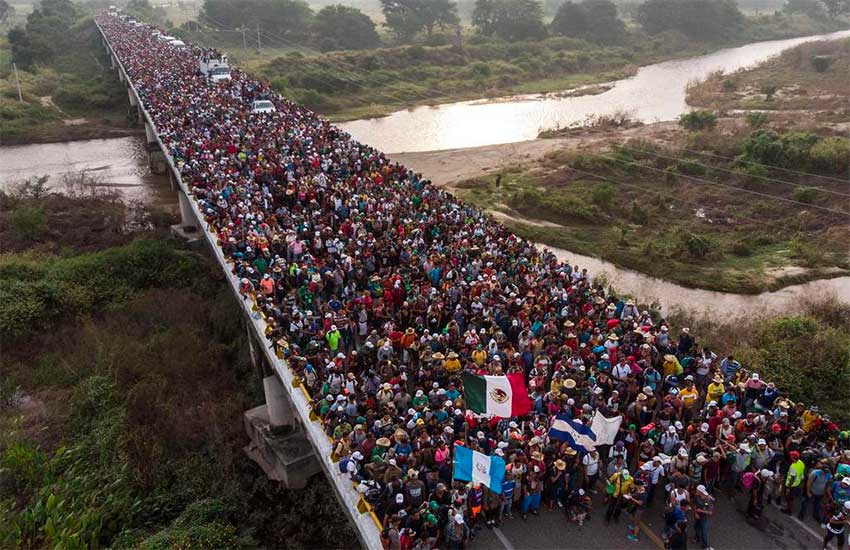 Migrants cross the Suchiate river between Mexico and Guatemala.