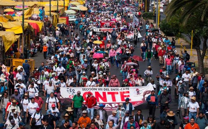 A CNTE protest march, a common sight in Oaxaca.