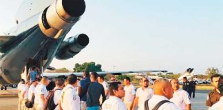 Cubans head home—but not voluntarily.