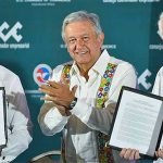 Business leaders Salazar, left, and Donohue, right, flank López Obrador.