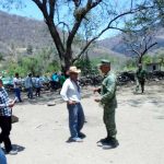 A farmer and a soldier parley in Guerrero.