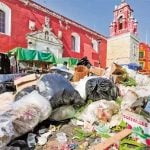Piles of garbage were growing in Oaxaca this week.
