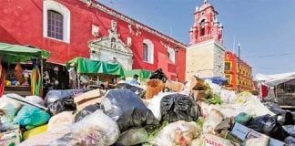 Piles of garbage were growing in Oaxaca this week.