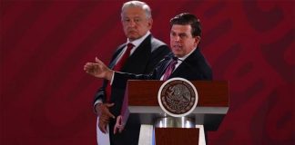 Consumer protection agency chief Sheffield speaks at the president's daily press conference.