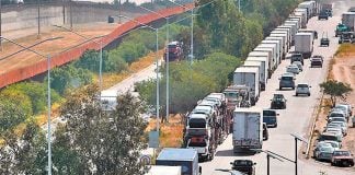 Trucks have a long wait in Tijuana.