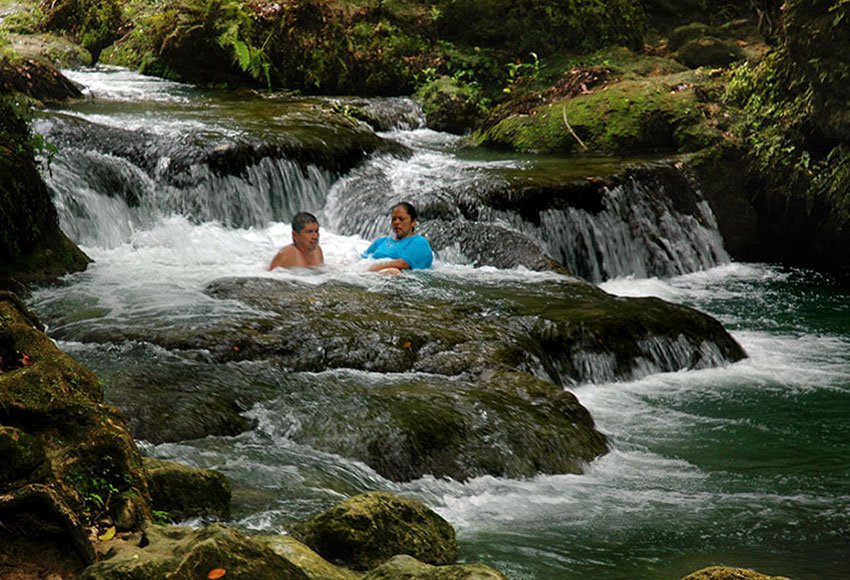 Bathers find a spot for themselves in Río El Salto.