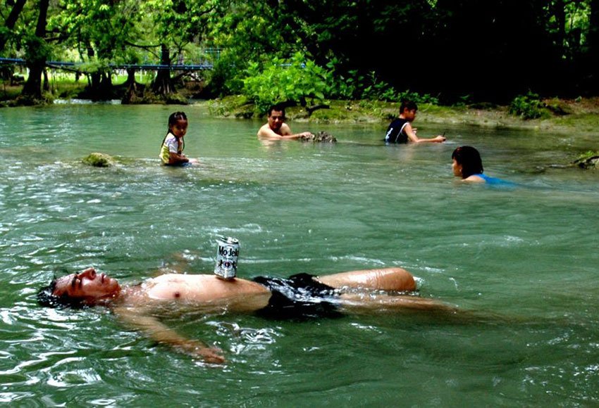 The proper way to enjoy the crystal-clear, warm water of El Salto River at Micos.