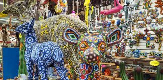 Life-sized, Huichol beaded deer at Artesanías Morett.