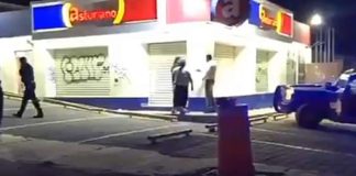 Officers at the scene of the attempted ATM robbery—by an officer.