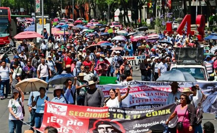 Teachers march in Mexico City yesterday.