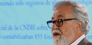 Encinas presents his report on hidden graves this morning.