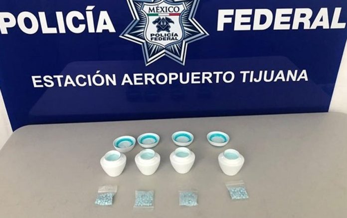 Police found fentanyl hidden inside jars of cream when they searched a courier service in Tijuana last fall.