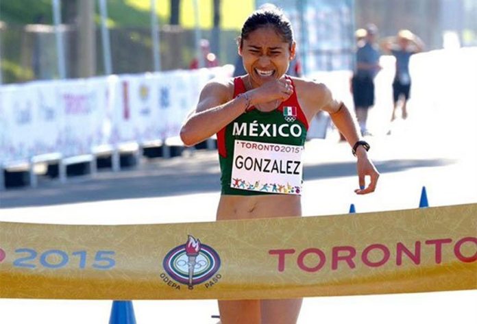 González crosses the finish line to win gold at the 2015 Pan American Games.