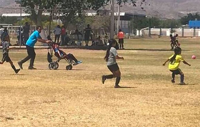 Marito and his father playing soccer in Ciudad Juárez.