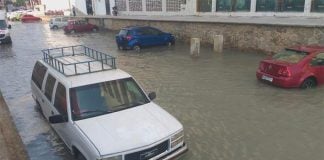 Pacific swell floods a street in Acapulco.