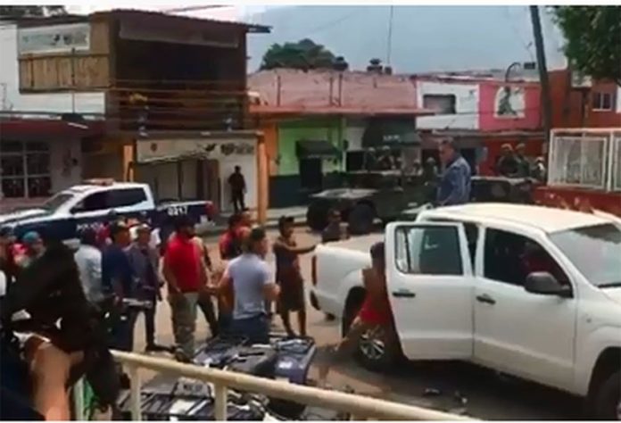 Residents challenge federal authorities in Oaxaca.