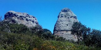 A few of the many large rocks in Quila frequented by climbers.