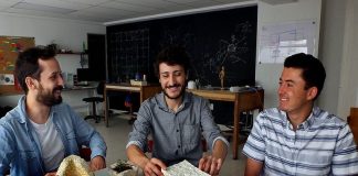 Three-fourths of the Radial team with samples of their Styrofoam substitute.