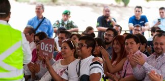 Prospective buyers at Sunday's narco-auction.