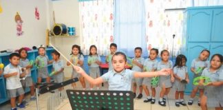The high-energy young director of a children's orchestra in Tamaulipas.