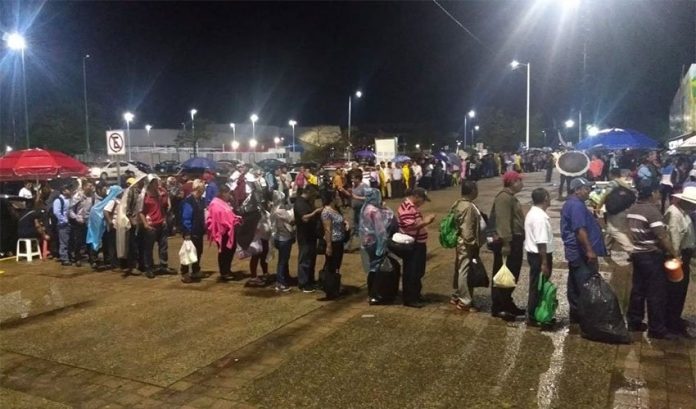 Dozens of people began lining up Sunday night to apply for jobs at the refinery site. Hiring began today.