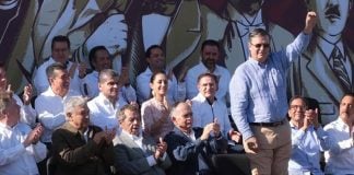 Ebrard, standing, was man of the moment Saturday in Tijuana.