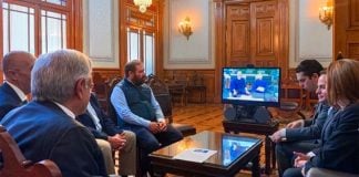 The president, left, chats with Facebook's Zuckerberg.