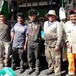 A Mexico City garbage truck crew.